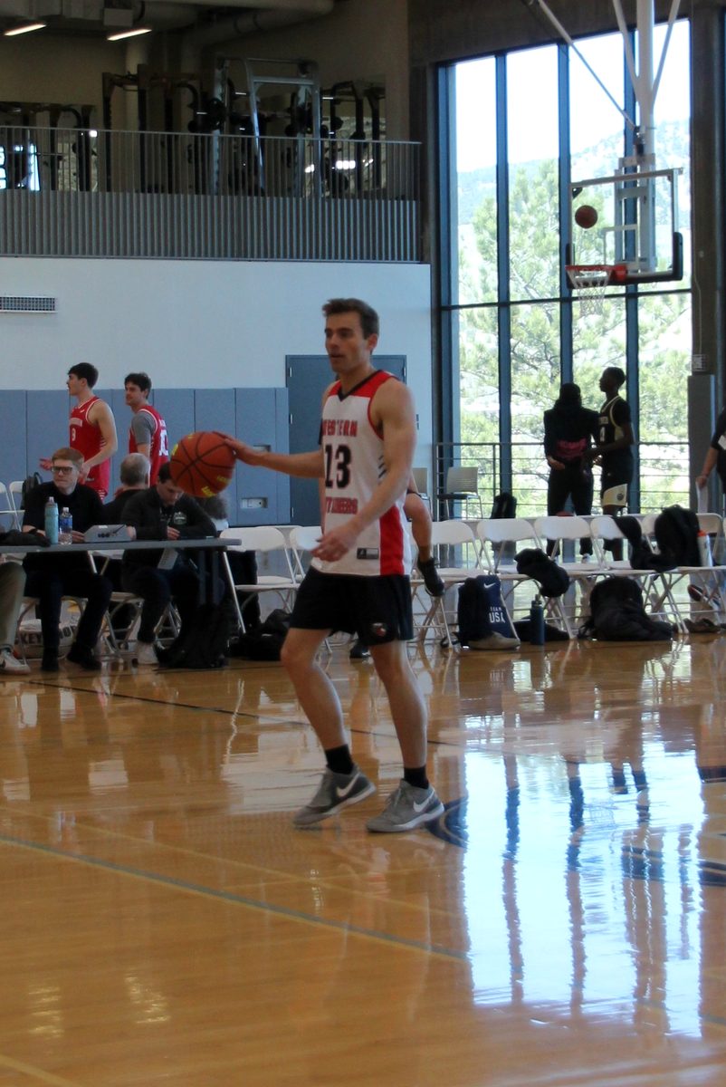 Kyle Wisniewski bringing the ball up as club basketball president