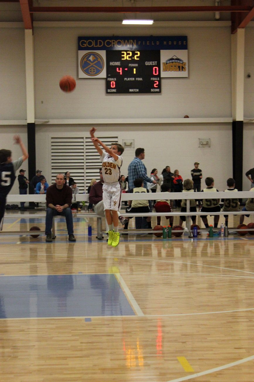 Kyle Wisniewski shooting at the Gold Crown Field House for Golden basketball, February 2015