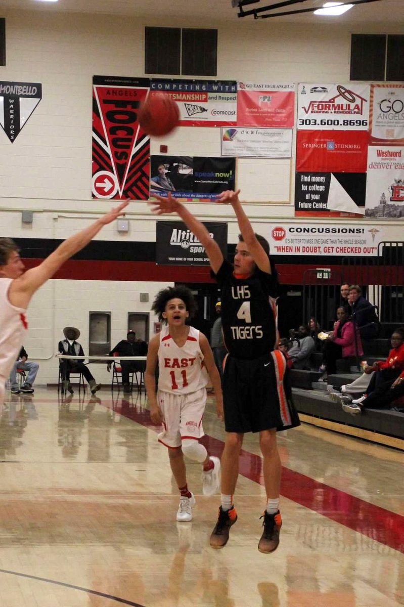 Kyle Wisniewski shooting for Lakewood High School Level III against Denver East, January 2018